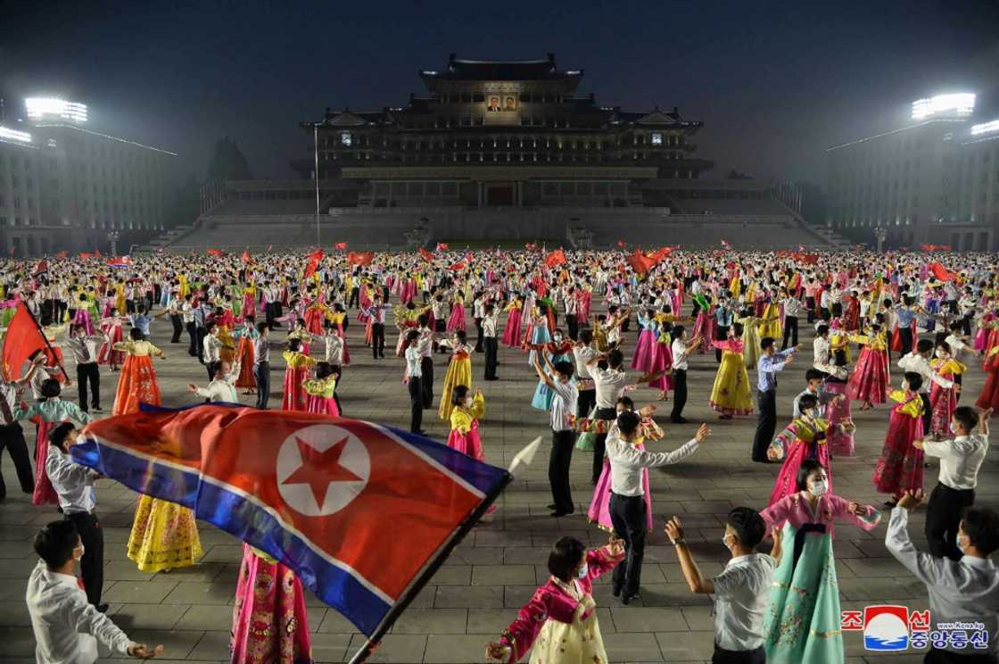 Young students celebrate the 69th anniversary of the Korean War at a night party in Pyongyang Young students celebrate the 69th anniversary of the Korean War at a night party in Pyongyang