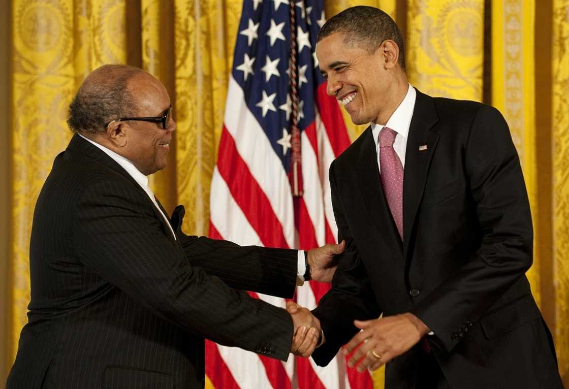 Then-US President Barack Obama awards theNational Medal of Arts to Jones at the White House in 2011