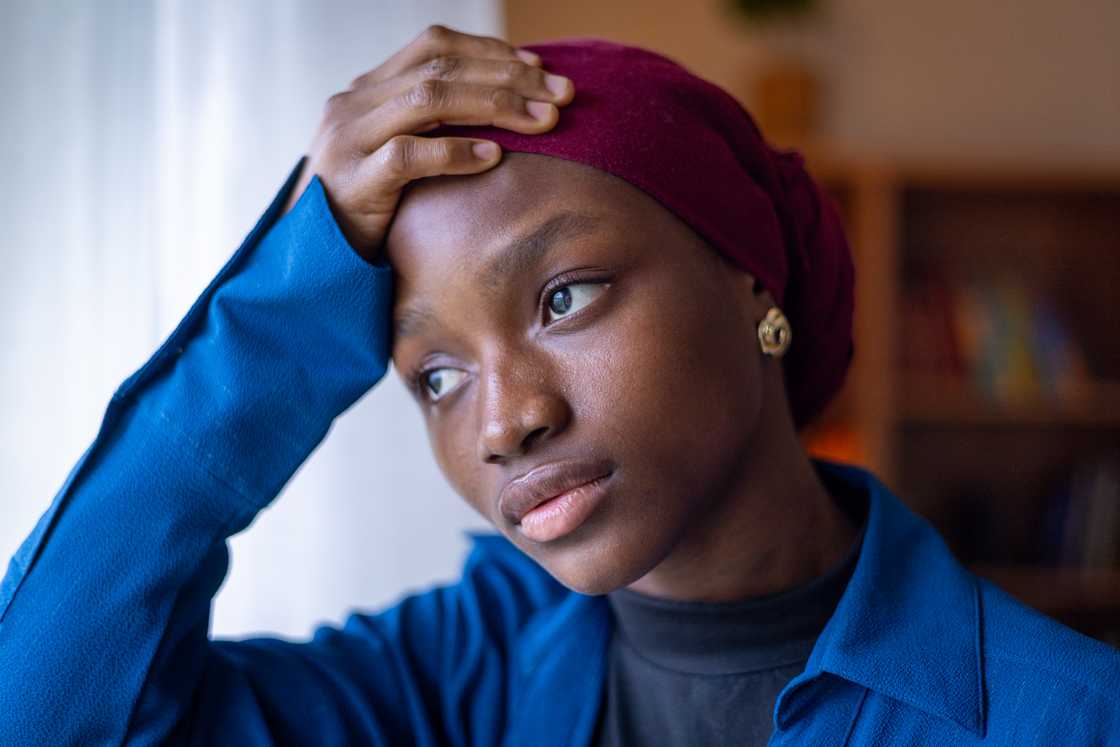 Reflective young muslim girl