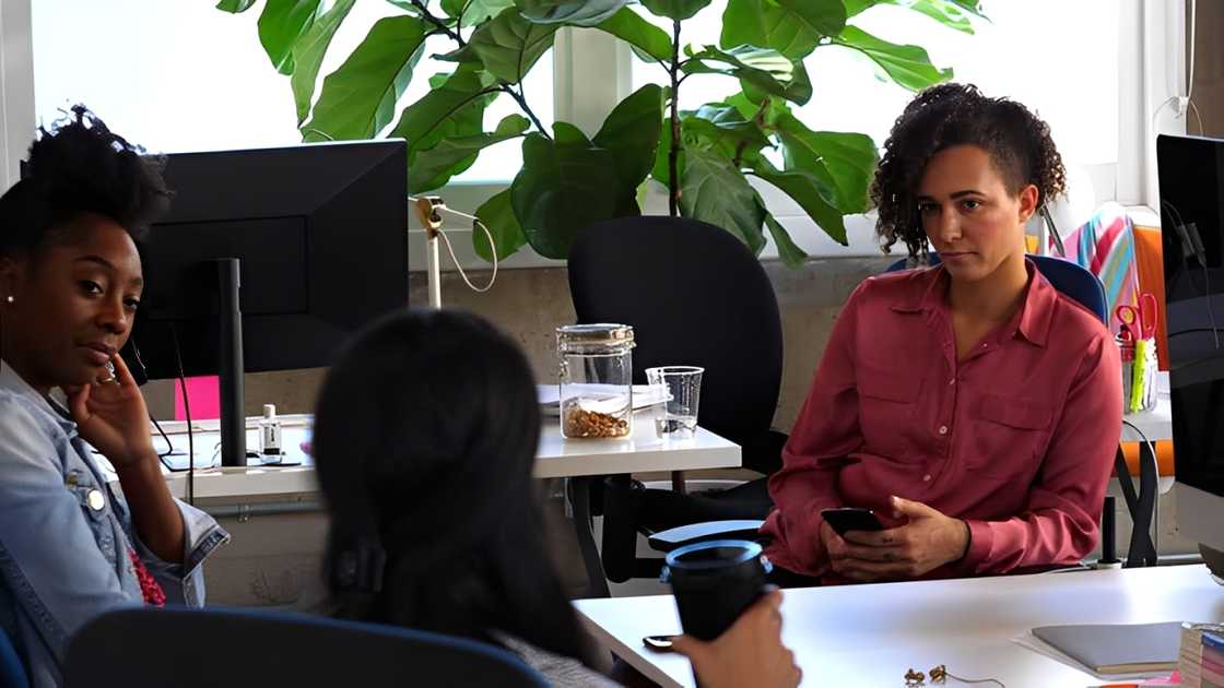 A female designer using a smartphone A female designer using a smartphone