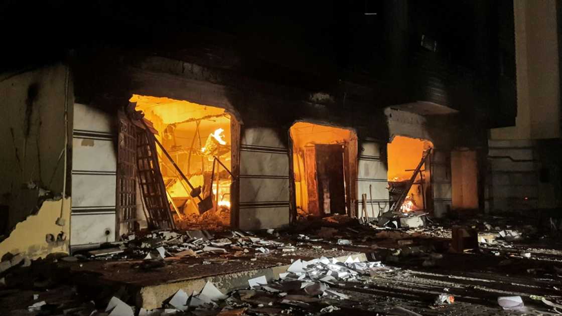 Protesters ransack the Libyan parliament building's offices and set fire to some of them after breaking through the perimeter on Friday evening Protesters ransack the Libyan parliament building's offices and set fire to some of them after breaking through the perimeter on Friday evening