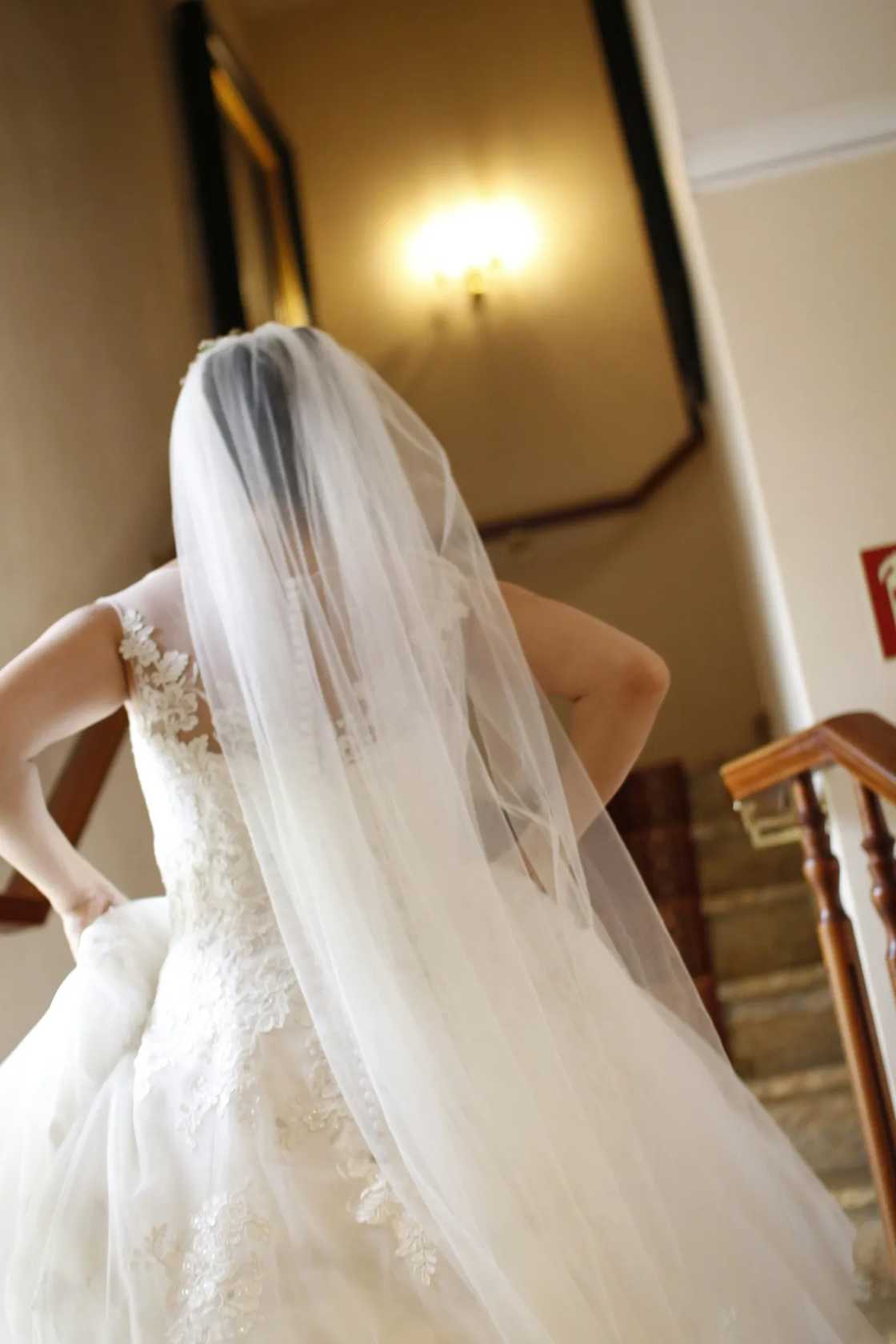 A bride running