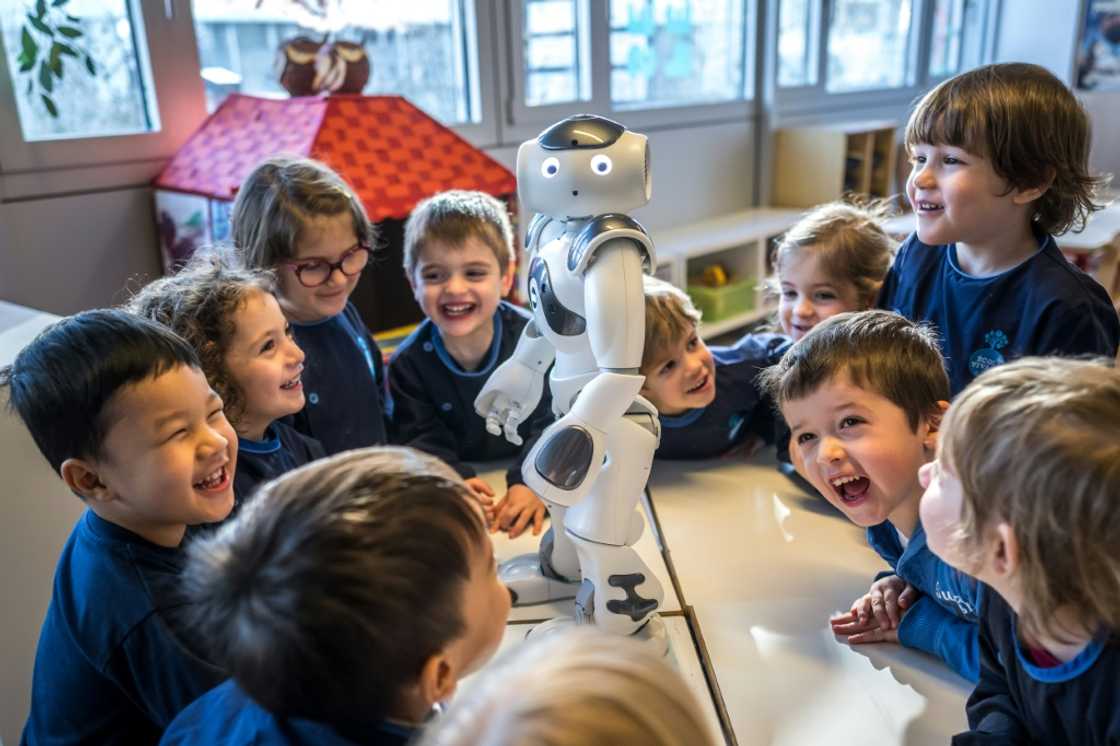 Nao, nao... Swiss children in a Lausanne creche have some fun with their new robot friend, Nao Nao, nao... Swiss children in a Lausanne creche have some fun with their new robot friend, Nao