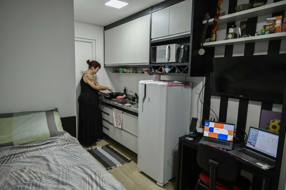Lara Maia's kitchen, office and bedroom is all in one space Lara Maia's kitchen, office and bedroom is all in one space