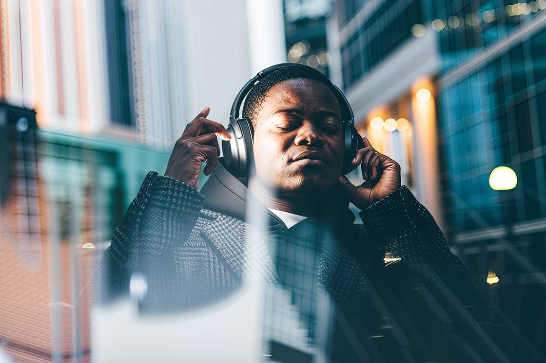 Portrait of a stylish man with earphones Portrait of a stylish man with earphones