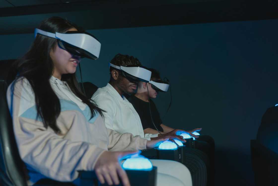 A group of adults playing virtual reality games A group of adults playing virtual reality games