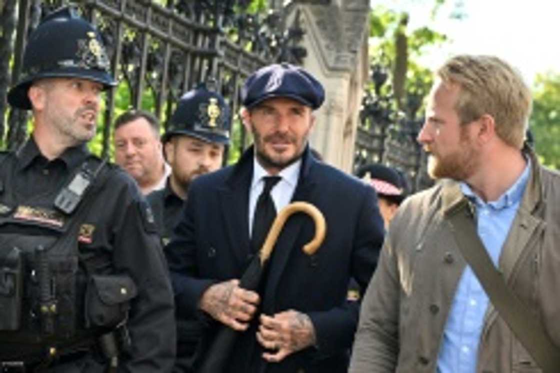 Former England footballer David Beckham joined the public in huge queues waiting to see the queen lying in state Former England footballer David Beckham joined the public in huge queues waiting to see the queen lying in state