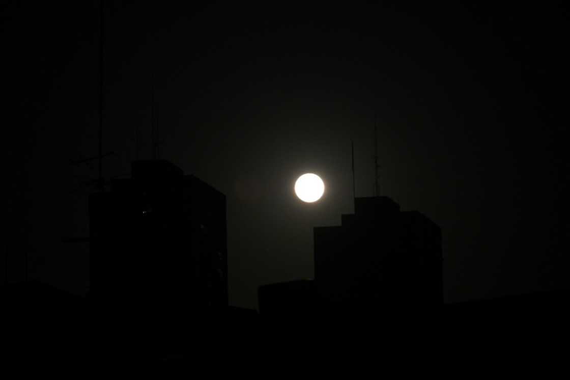 A full moon rises over buildings during a general blackout in Havana, Cuba on March 14, 2025, the country's fourth major power outage in five months A full moon rises over buildings during a general blackout in Havana, Cuba on March 14, 2025, the country's fourth major power outage in five months