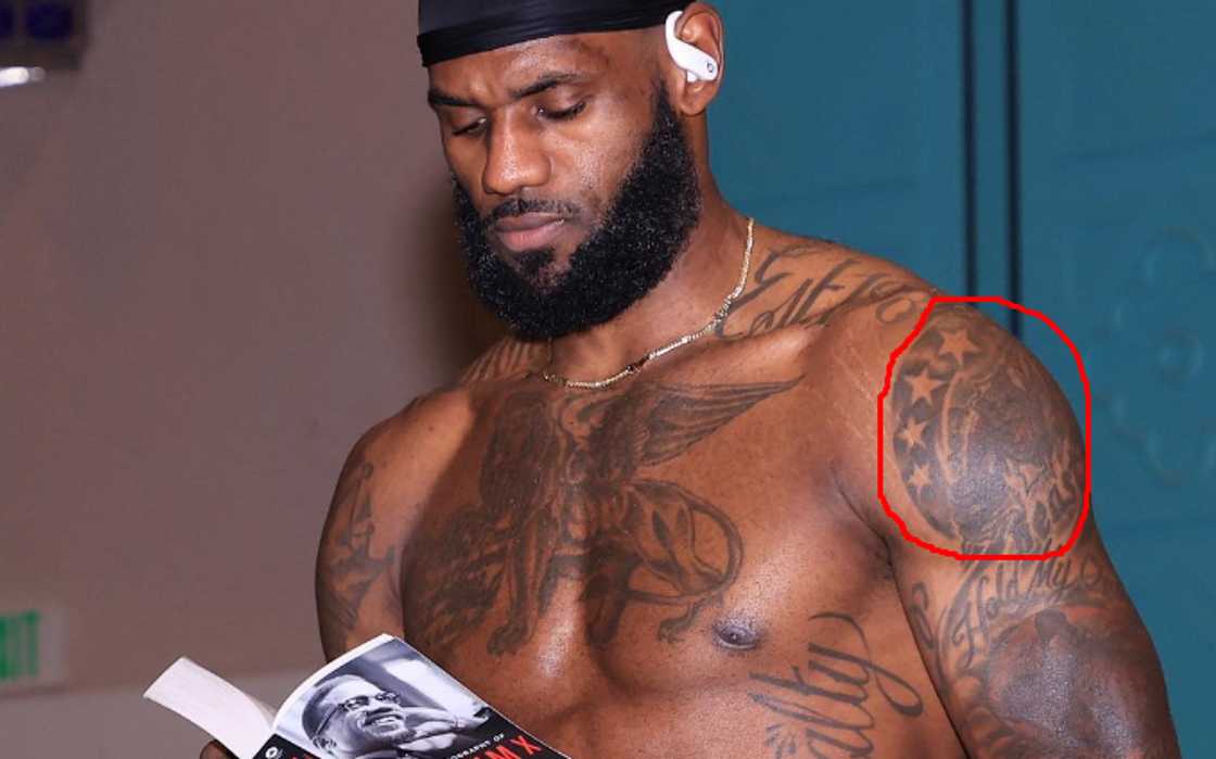 LeBron James has stars tattoo on his upper left arm LeBron James has stars tattoo on his upper left arm