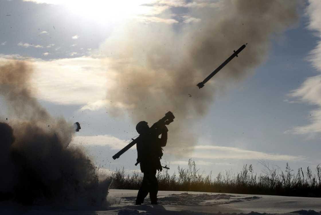 A Ukrainian soldier fires a surface-to-air missile during a military exercise in December 2014 A Ukrainian soldier fires a surface-to-air missile during a military exercise in December 2014