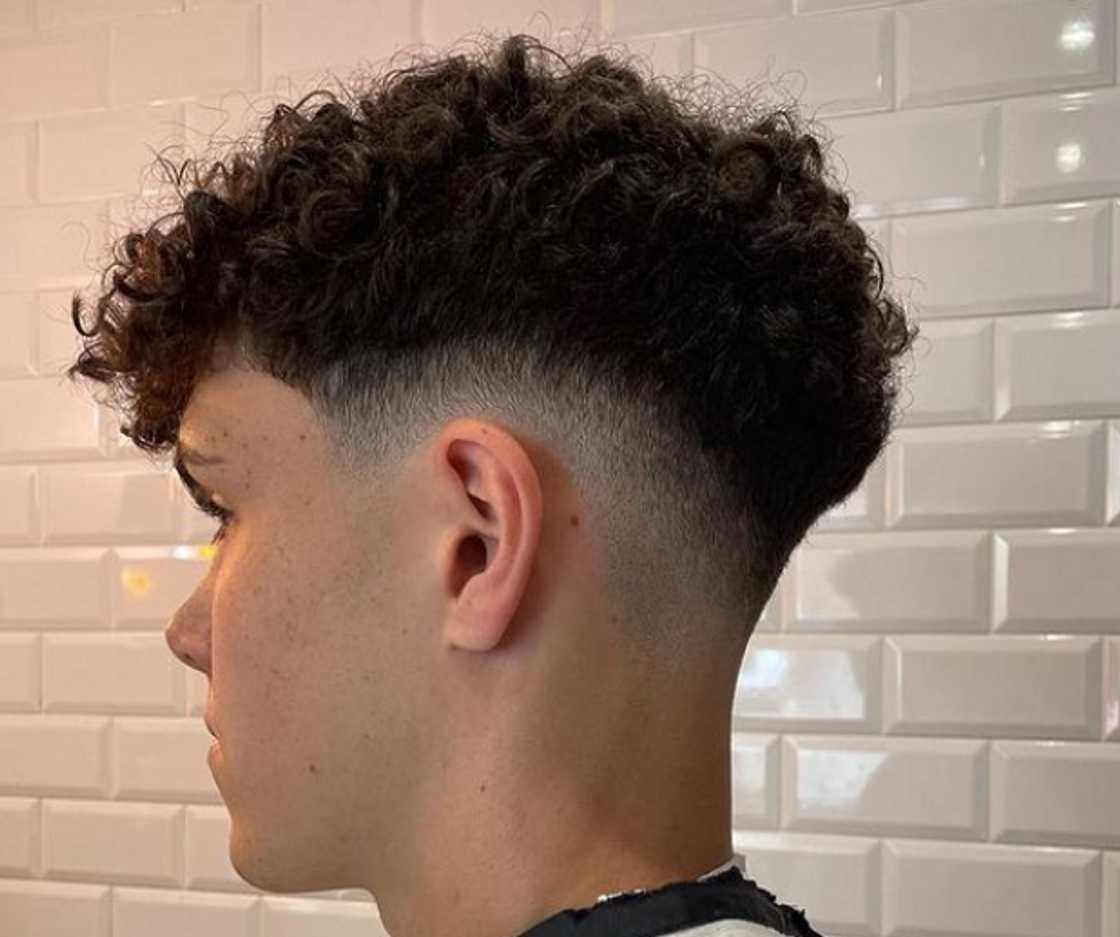 Curly low bald fade