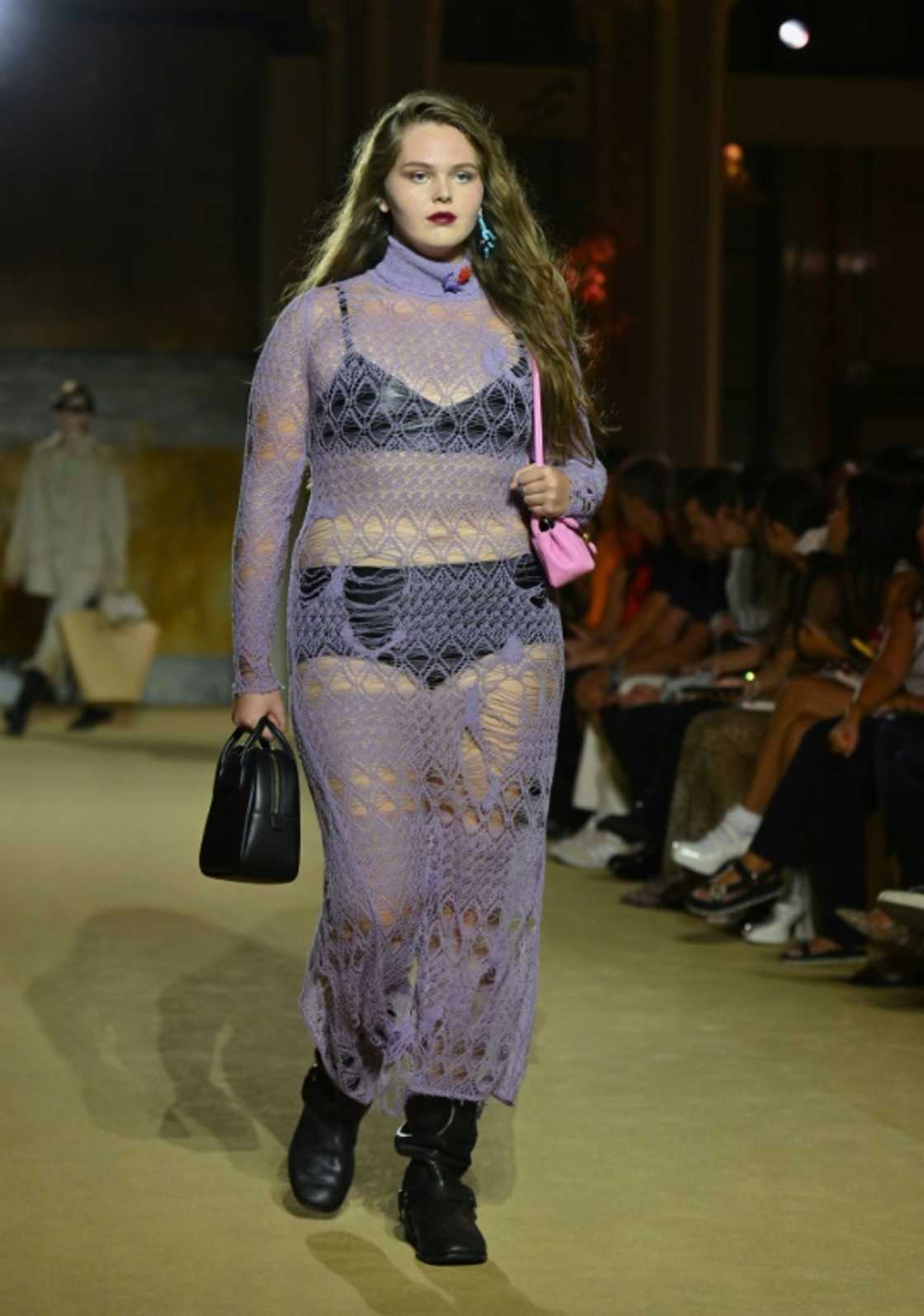 A model walks the runway in a Coach dress as part of New York Fashion Week