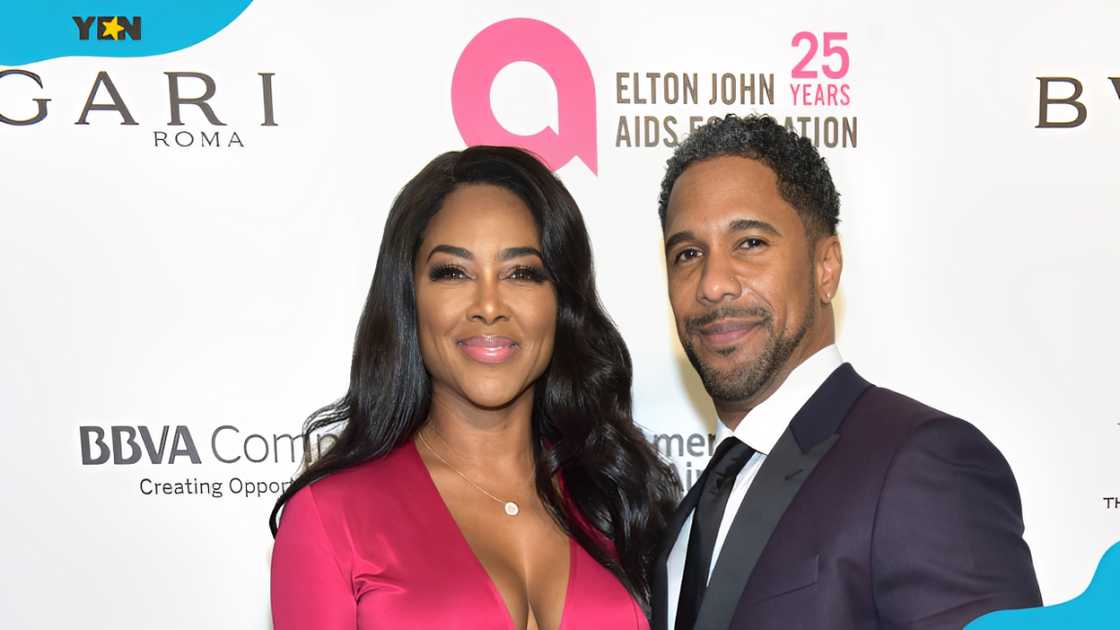 Kenya Moore and Marc Daly at the 26th annual Elton John AIDS Foundation's Academy Awards Viewing Party. Kenya Moore and Marc Daly at the 26th annual Elton John AIDS Foundation's Academy Awards Viewing Party.
