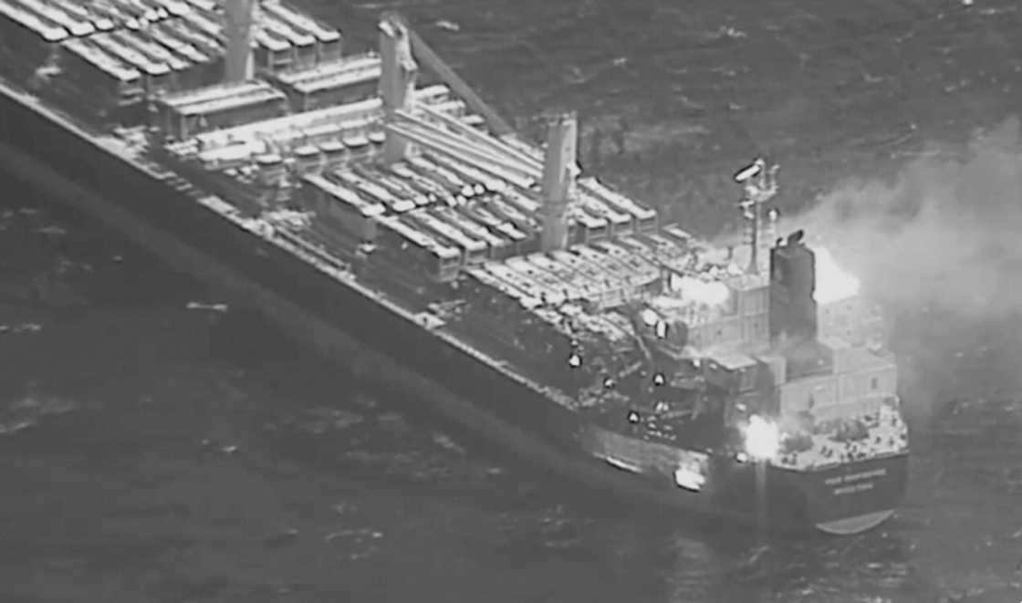 This image obtained from the US Central Command (CENTCOM) on March 6, 2024, shows the Barbados-flagged, Liberian-owned bulk carrier M/V True Confidence after it was hit by an anti-ship ballistic missile launched by Iran-backed Huthi rebels