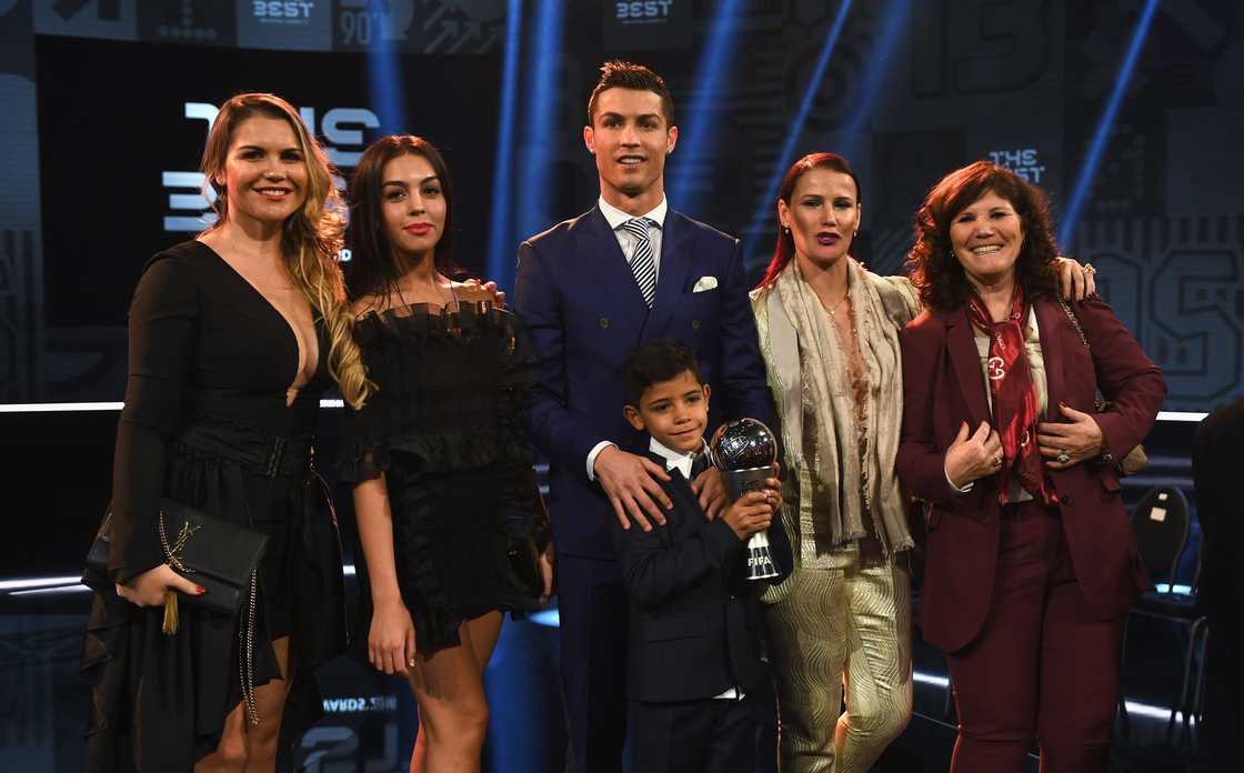 The Best FIFA Men's Player Award winner Cristiano Ronaldo of Portugal and Real Madrid poses with Georgina Rodriguez (2ndL), his mother Maria Dolores dos Santos Aveiro (R), his sisters and son on January 9, 2017 in Zurich, Switzerland The Best FIFA Men's Player Award winner Cristiano Ronaldo of Portugal and Real Madrid poses with Georgina Rodriguez (2ndL), his mother Maria Dolores dos Santos Aveiro (R), his sisters and son on January 9, 2017 in Zurich, Switzerland