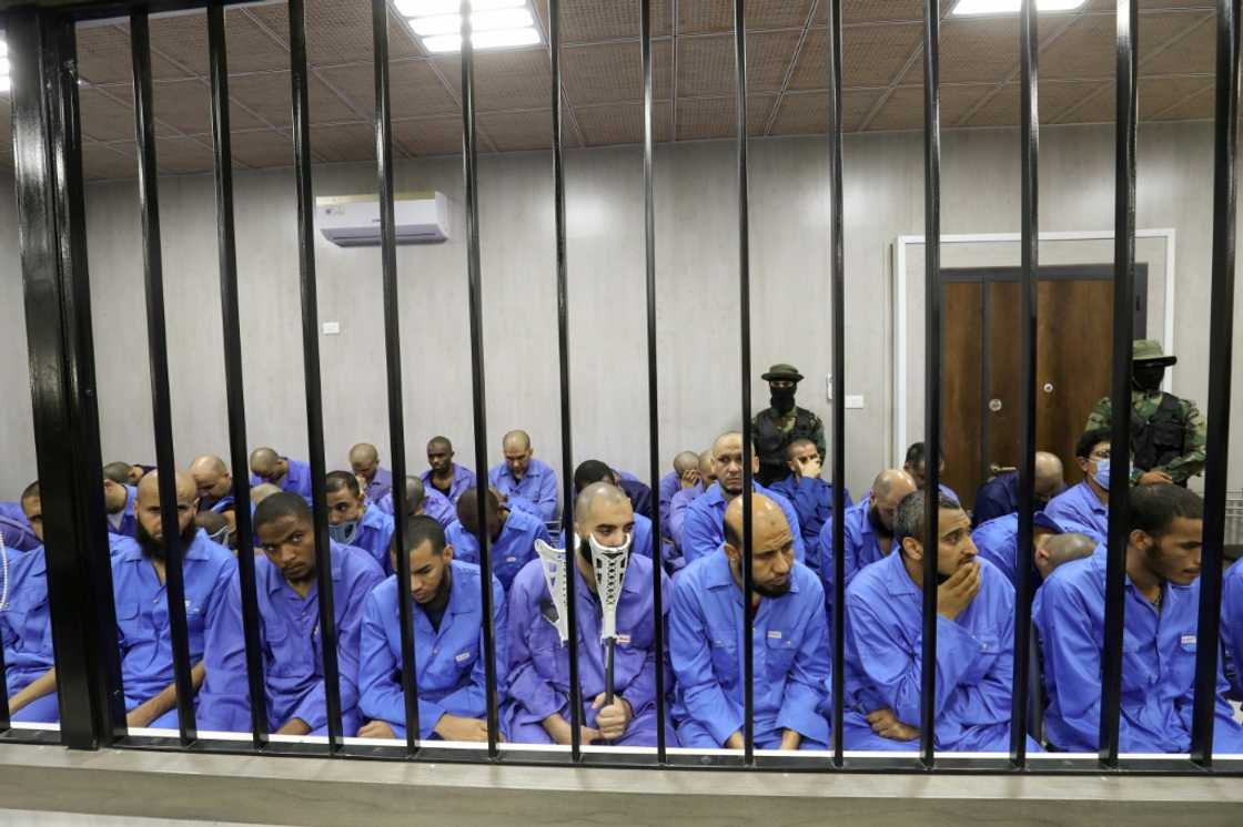 Suspected members of the Islamic State group sit in the dock during their trial in the western Libyan city of Misrata Suspected members of the Islamic State group sit in the dock during their trial in the western Libyan city of Misrata