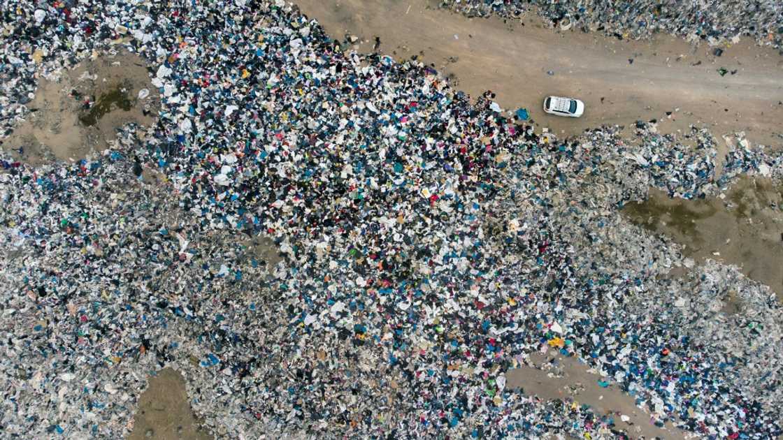 Aerial view of used clothes discarded in the Atacama desert, in Chile, on September 26, 2021 Aerial view of used clothes discarded in the Atacama desert, in Chile, on September 26, 2021