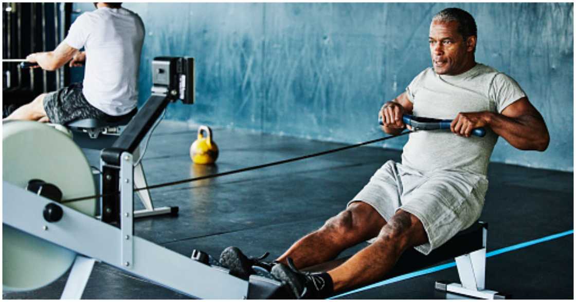 A man works out at a gym