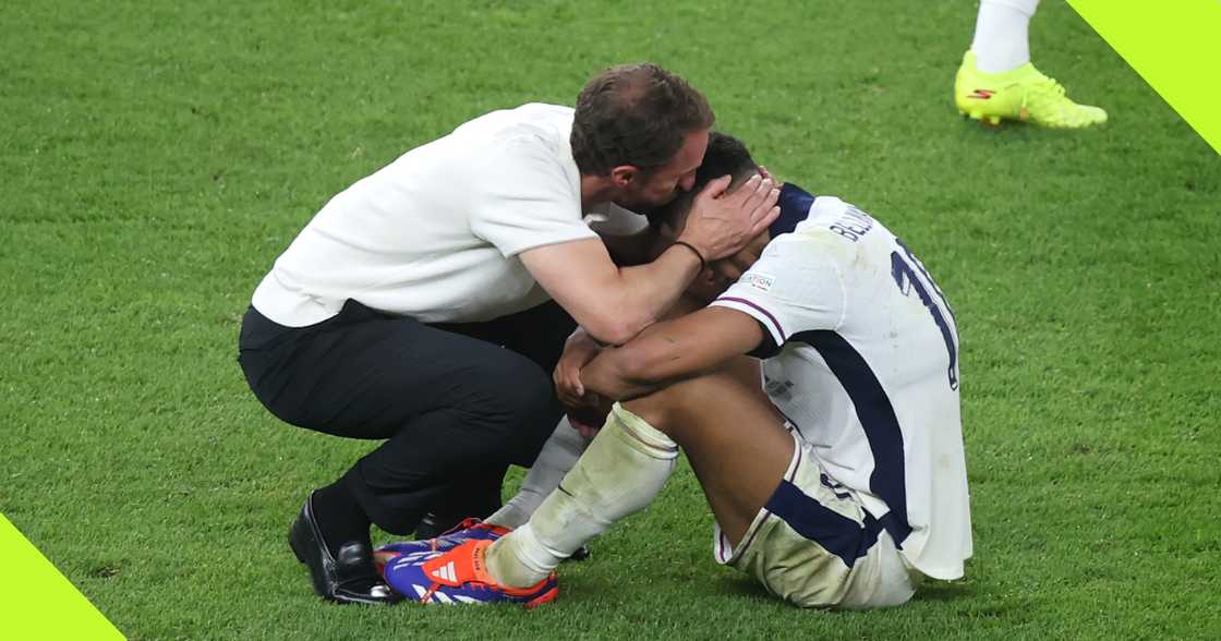 Gareth Southgate consoles Jude Bellingham. Gareth Southgate consoles Jude Bellingham.