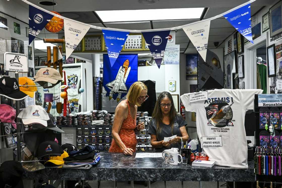 As soon as they enter the store Space Shirts, visitors are greeted with Artemis rocket t-shirts for sale As soon as they enter the store Space Shirts, visitors are greeted with Artemis rocket t-shirts for sale