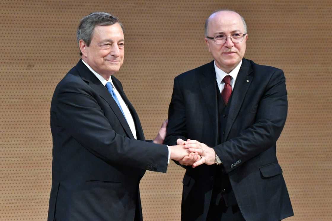 Italian Prime Minister Mario Draghi (L) and Algeria's Prime Minister Aimene Benabderrahmane shake hands in Algiers. Algeria is Africa's biggest gas exporter and supplies around 11 percent of the natural gas consumed in Europe Italian Prime Minister Mario Draghi (L) and Algeria's Prime Minister Aimene Benabderrahmane shake hands in Algiers. Algeria is Africa's biggest gas exporter and supplies around 11 percent of the natural gas consumed in Europe