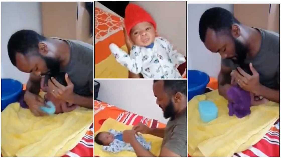 Heartwarming moment father bathes newborn baby, clothes him, his video recieves massive praise Heartwarming moment father bathes newborn baby, clothes him, his video recieves massive praise