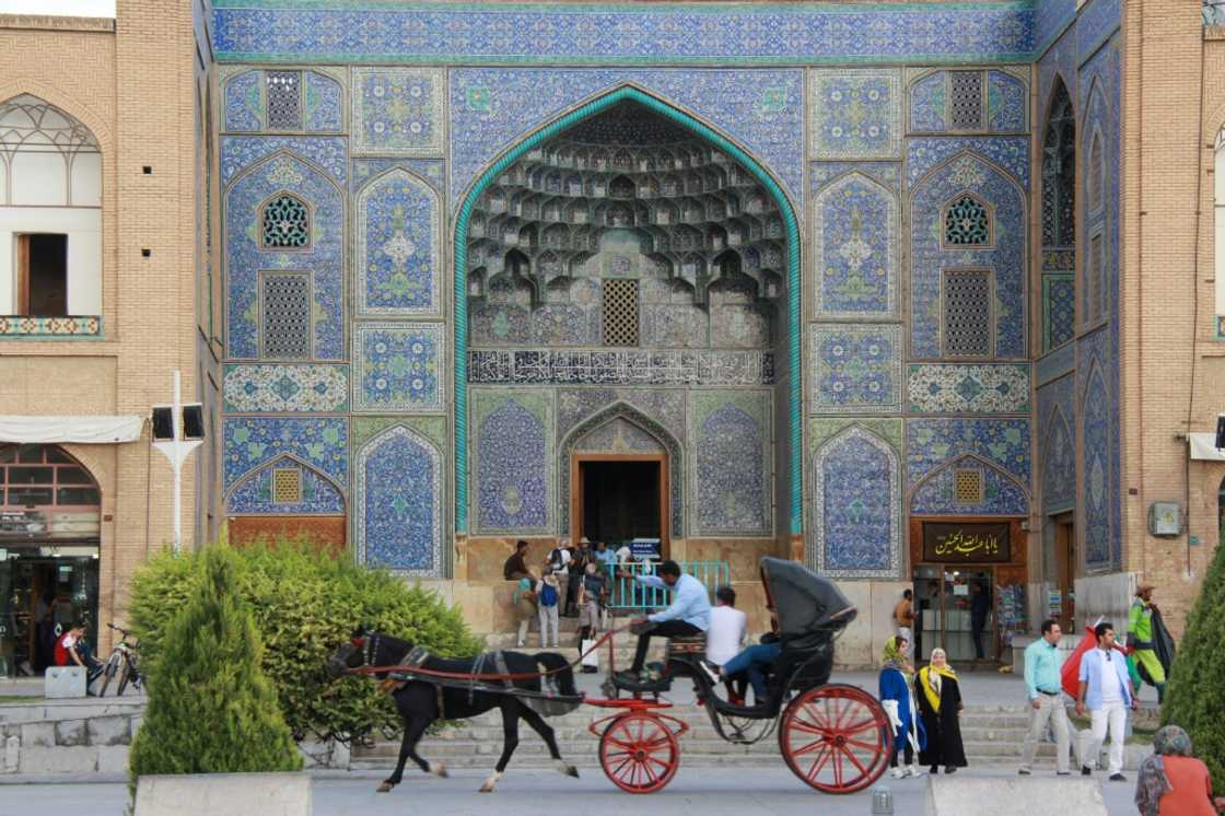Tourists visit the Lotfallah Mosque on Naqsh-e Jahan Square in the central Iranian city of Isfahan Tourists visit the Lotfallah Mosque on Naqsh-e Jahan Square in the central Iranian city of Isfahan