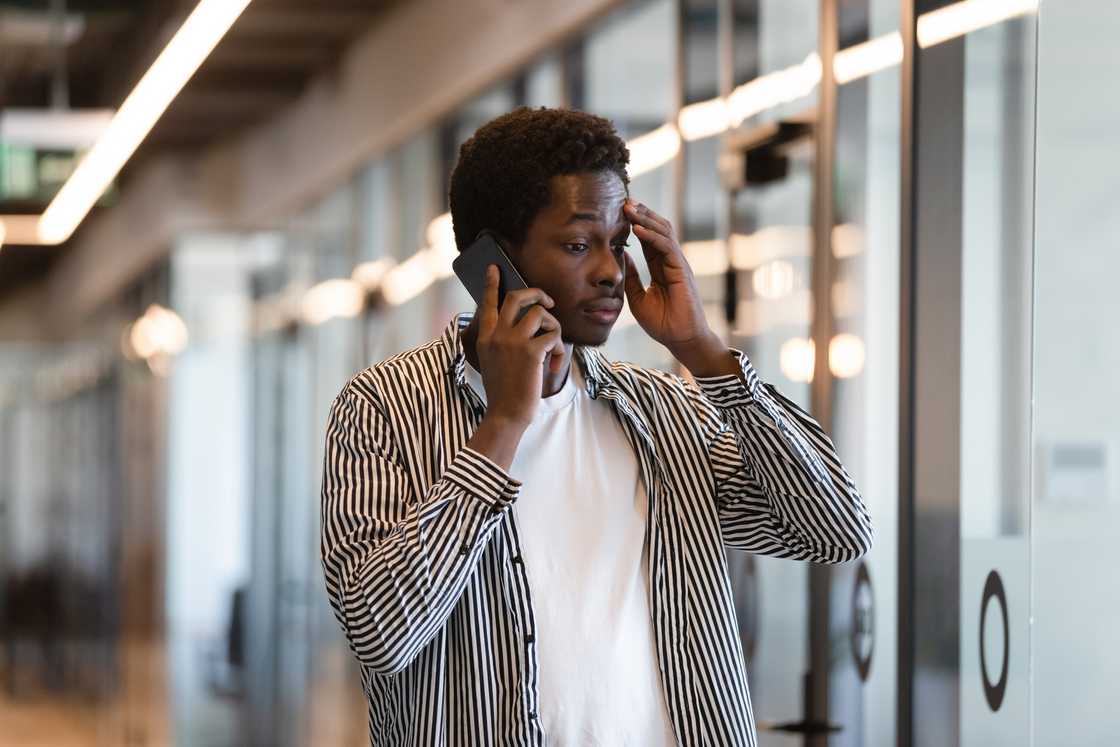 A man makes a call A man makes a call