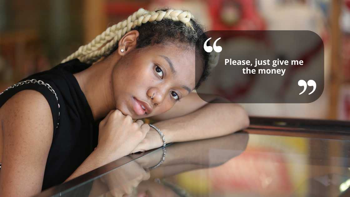 A stressed woman lying on a glass counter