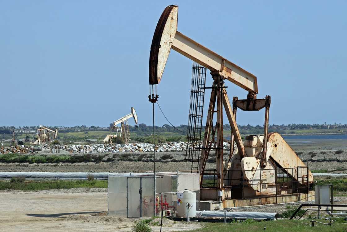 Oil prices have been hit by lower demand expectations owing to the prospect of higher interest rates