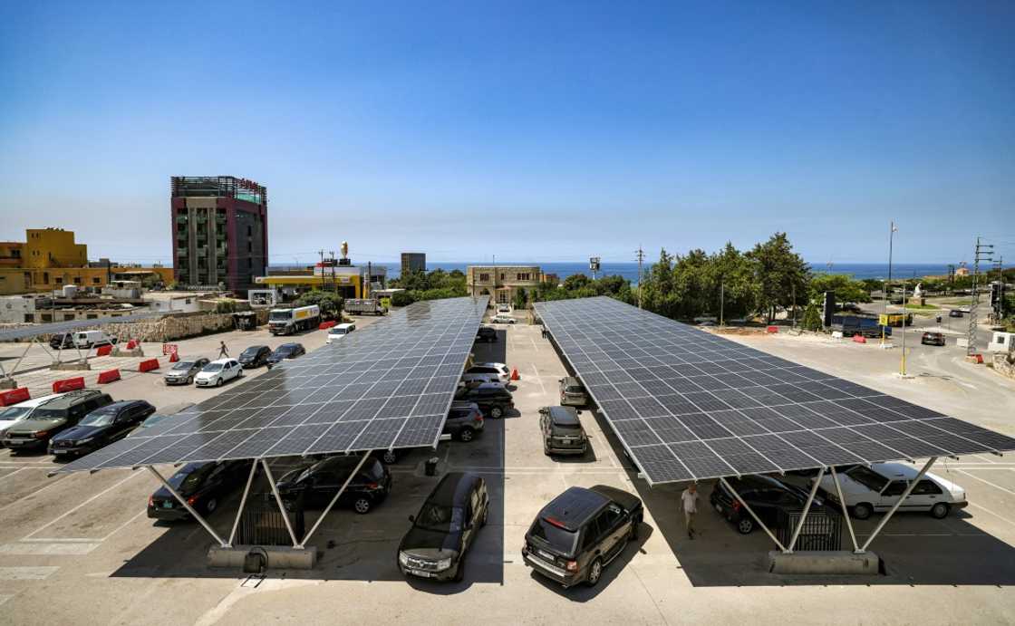 An hour's drive south of Toula, a branch of Spinneys supermarket is also installing panels in the parking lot and rooftop to slash its generator bills