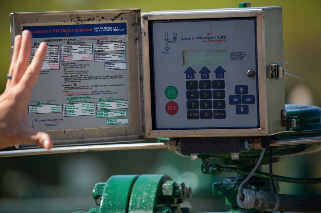 Jason John Mounts, director of Southern Pennsylvania operations for Diversified Energy, discusses the natural gas extraction process at a deep well site in Franklin Township, Washington County, Pennsylvania