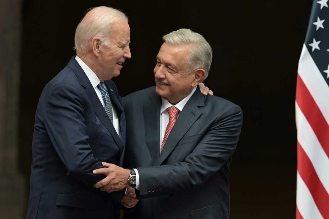US President Joe Biden shakes hands with his Mexican counterpart Andres Manuel Lopez Obrador during a welcome ceremony at the National Palace in Mexico City US President Joe Biden shakes hands with his Mexican counterpart Andres Manuel Lopez Obrador during a welcome ceremony at the National Palace in Mexico City