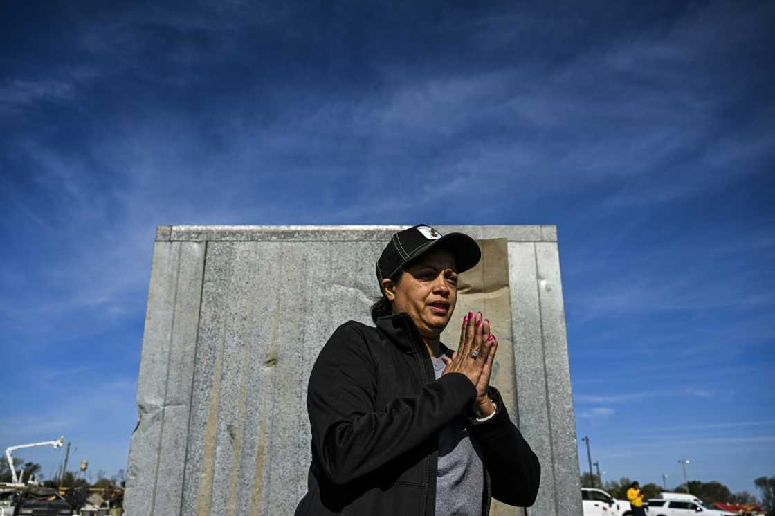 Tracy Harden, owner of Chuck's Dairy Bar, hid with her husband and employees inside the restaurant's giant cooler during a tornado that devastated their US state of Mississippi Tracy Harden, owner of Chuck's Dairy Bar, hid with her husband and employees inside the restaurant's giant cooler during a tornado that devastated their US state of Mississippi
