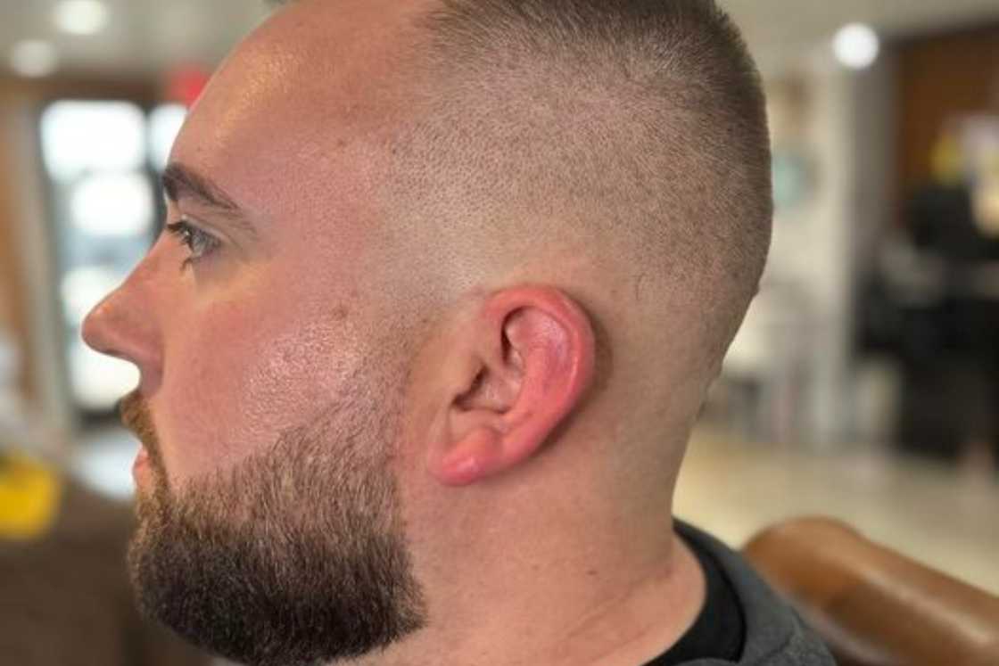 Medium tight skin skin fade with nice tapered out beard