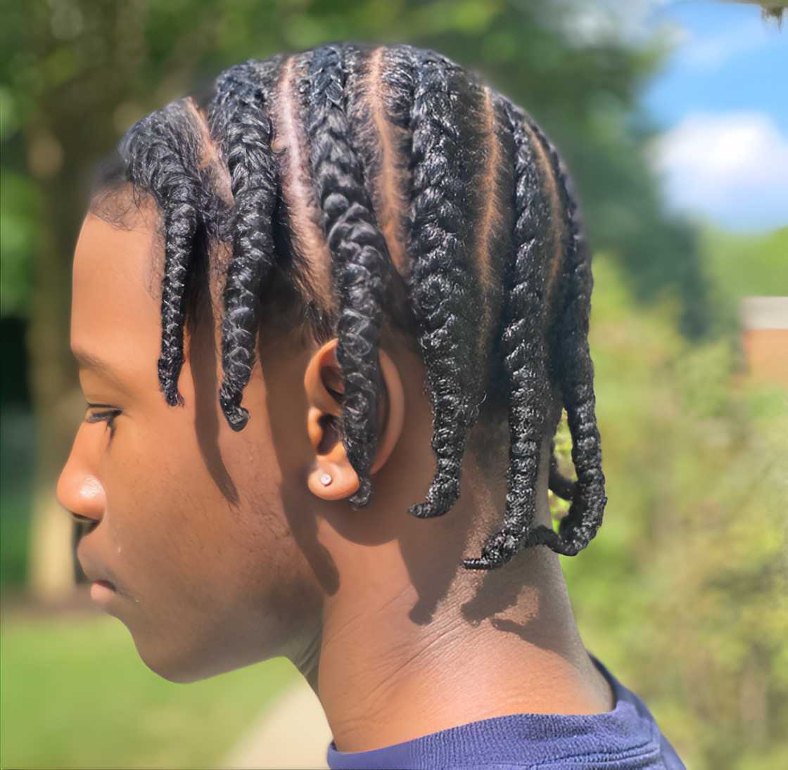 A boy with Pop Smoke braids