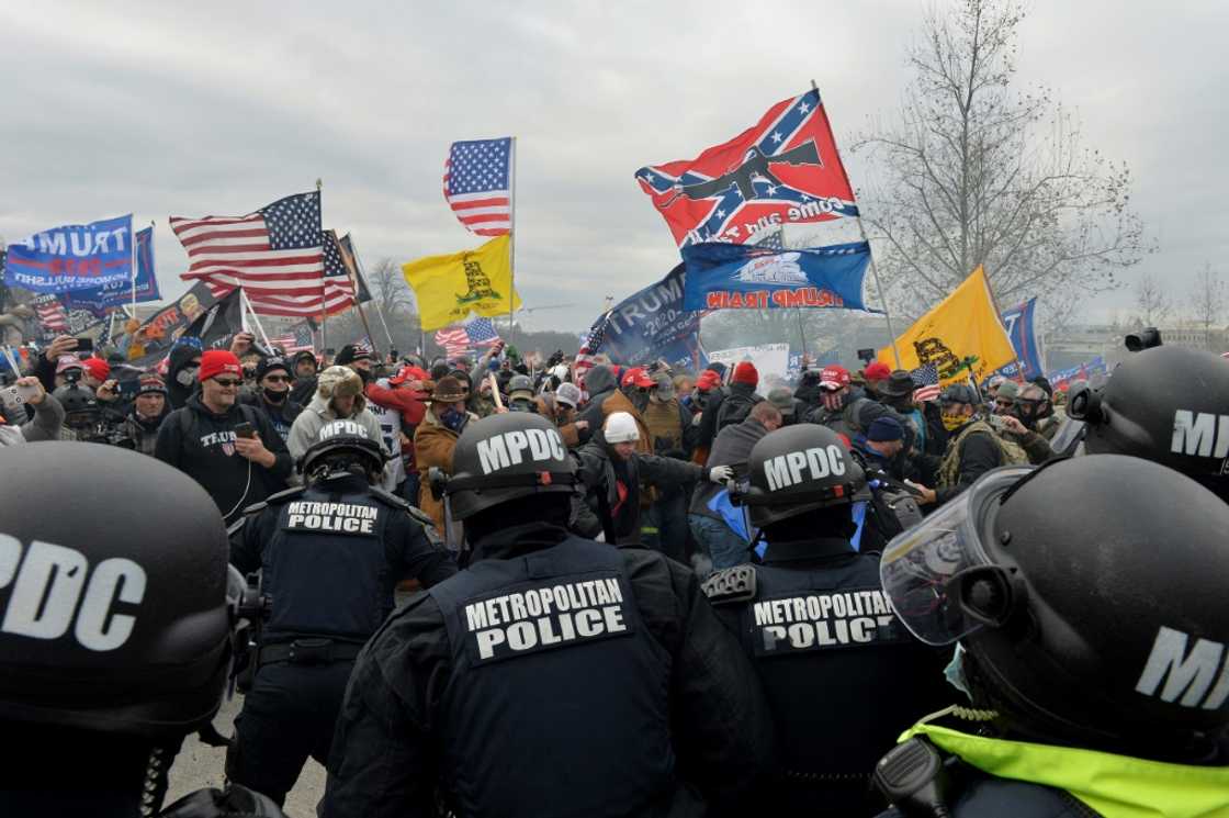 Supporters of former president Donald Trump clash with police and security forces as they storm the US Capitol on January 6, 2021 Supporters of former president Donald Trump clash with police and security forces as they storm the US Capitol on January 6, 2021