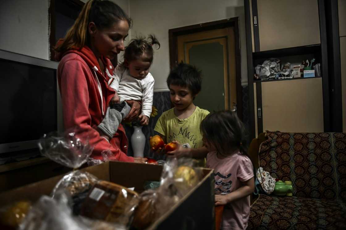 Families like this one need food donations as Hungary is hit by sky-high inflation and recession Families like this one need food donations as Hungary is hit by sky-high inflation and recession