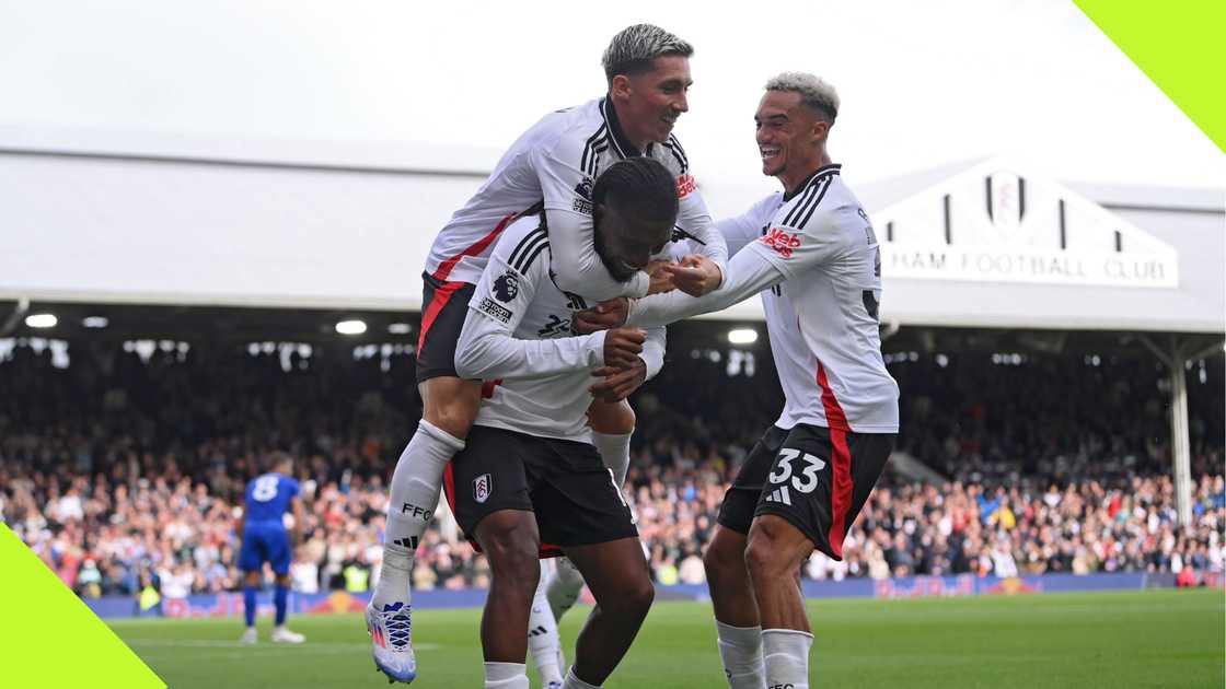 Alex Iwobi celebrates with his teammates after scoring for Fulham against Leicester City. Alex Iwobi celebrates with his teammates after scoring for Fulham against Leicester City.