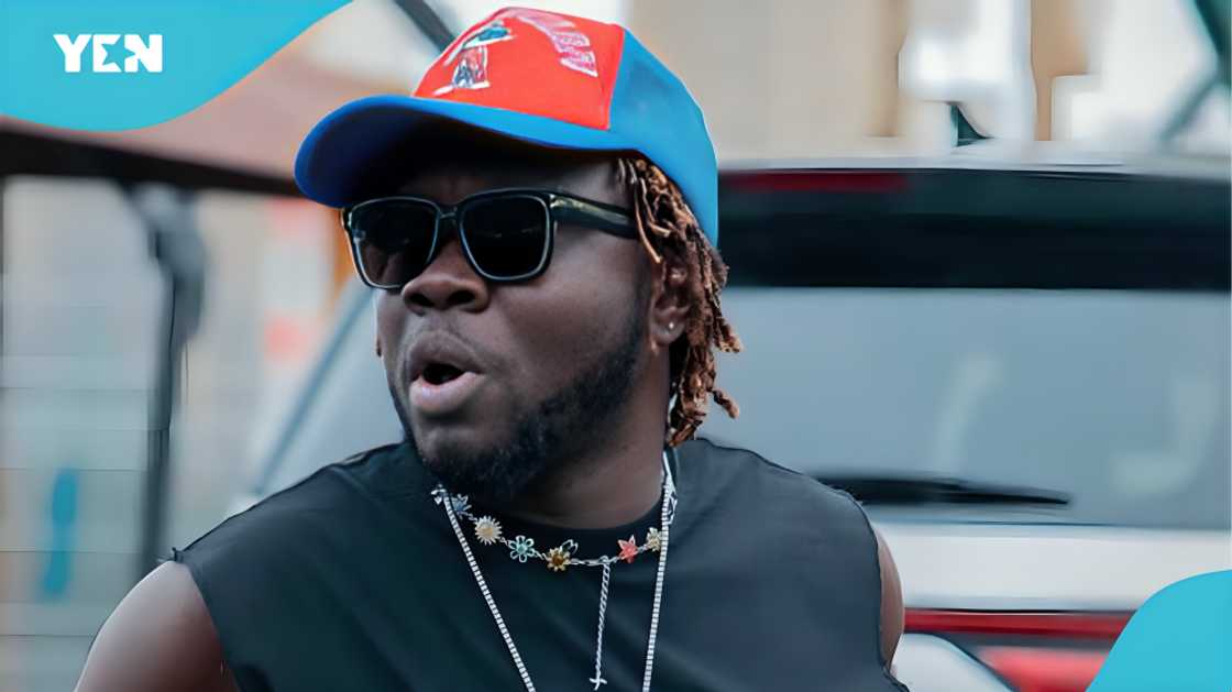 Showboy rearrested, Showboy handcuffs photos, Ghanaian rapper news, Showboy escape, Ghana Police arrest, Showboy social media reactions, AMG business musician