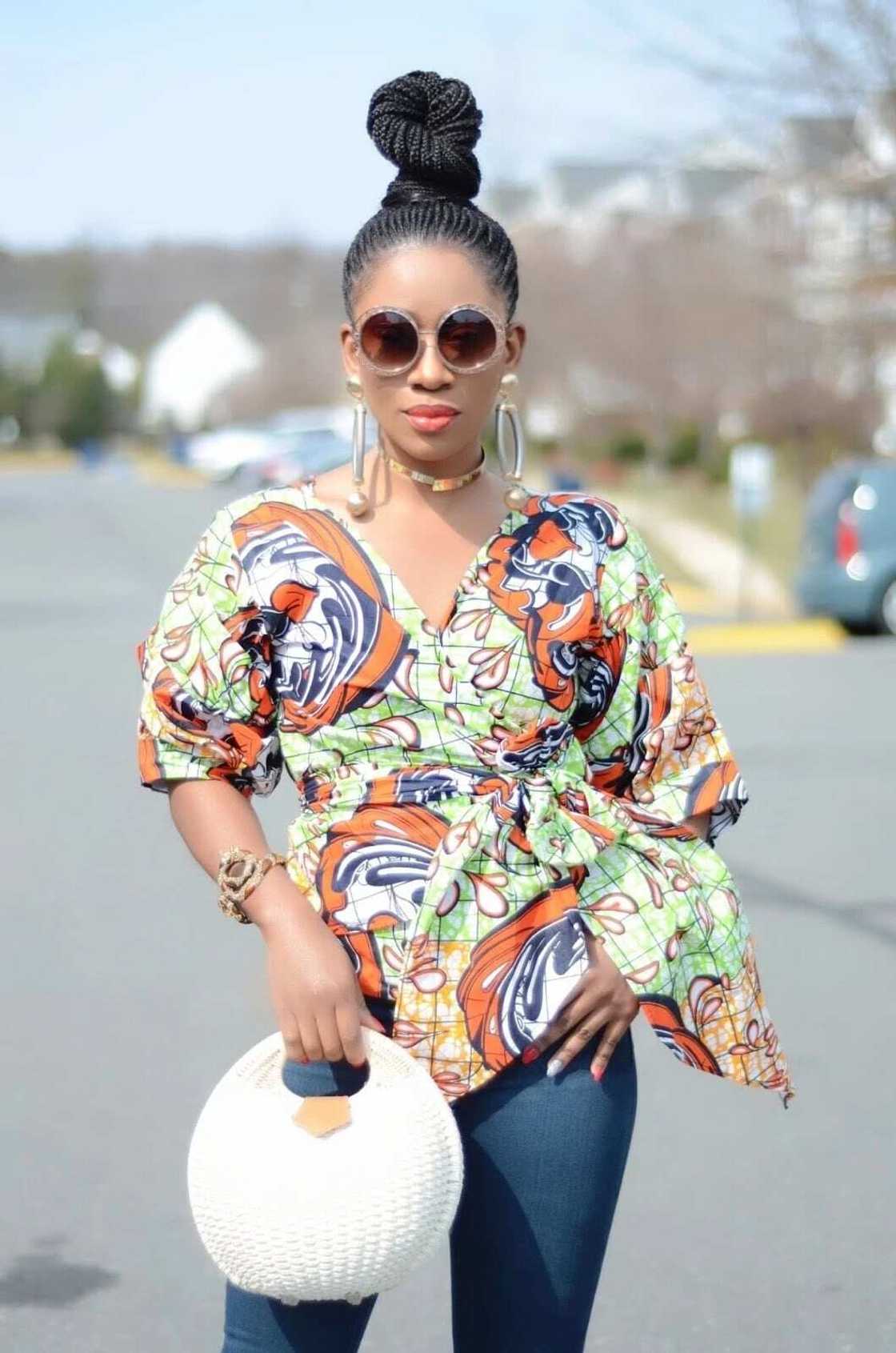 ankara tops for ladies
stylish tops to wear with jeans
ankara blouse on jeans
trendy styles made with ankara
peplum ankara tops
ankara tops designs