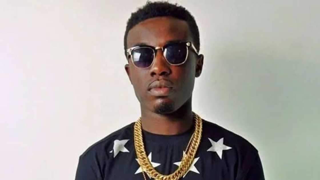 Criss Waddle wearing a shirt and sunshades