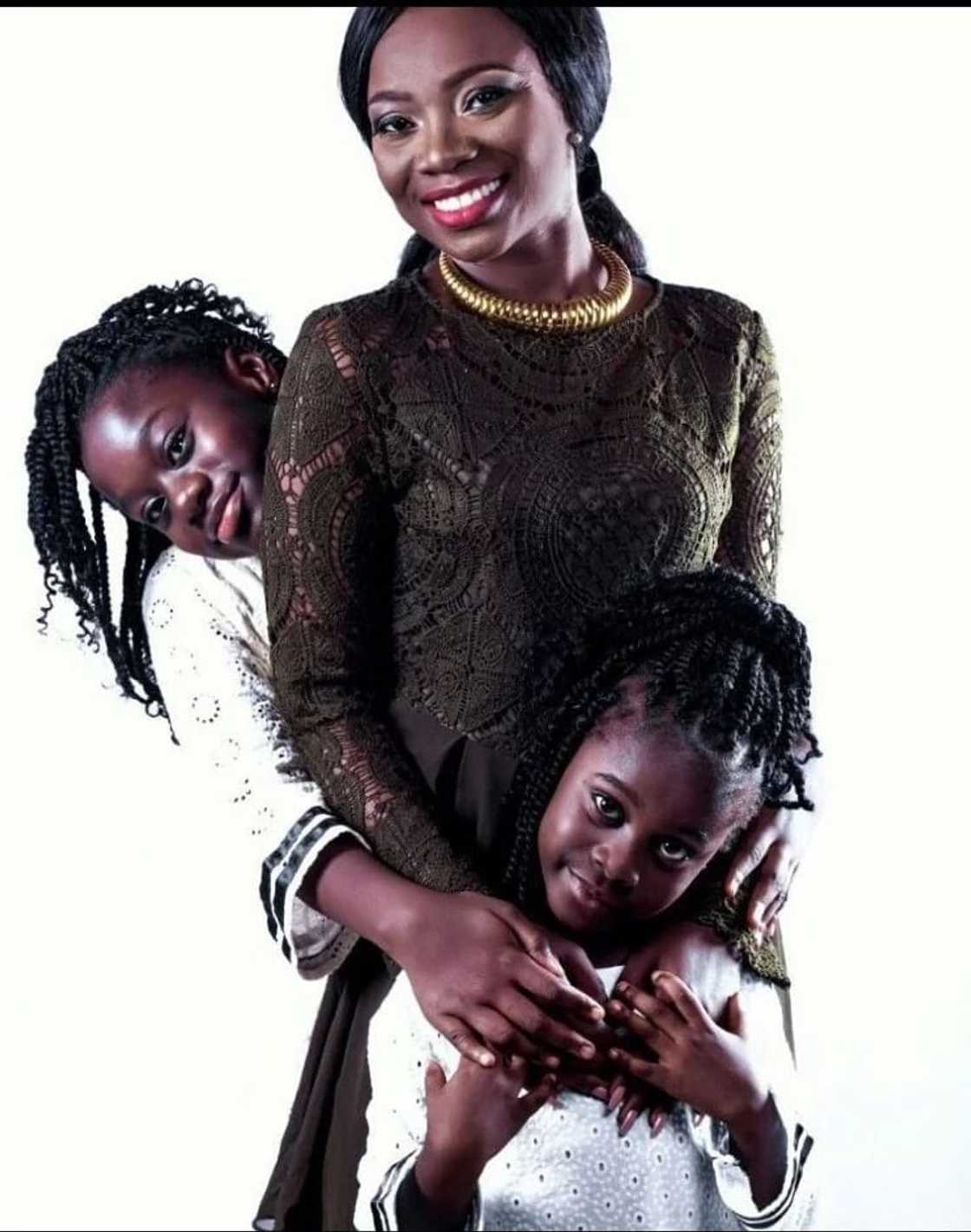 Stacy Amoateng in photo with her two daughters