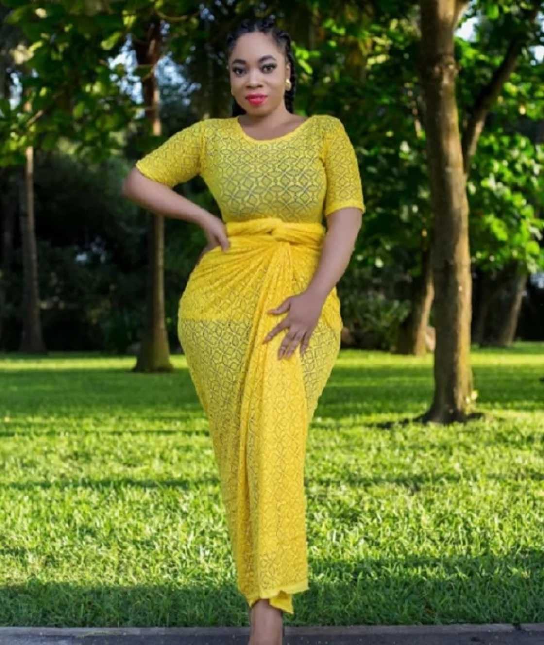Moesha Boduong wearing a yellow dress