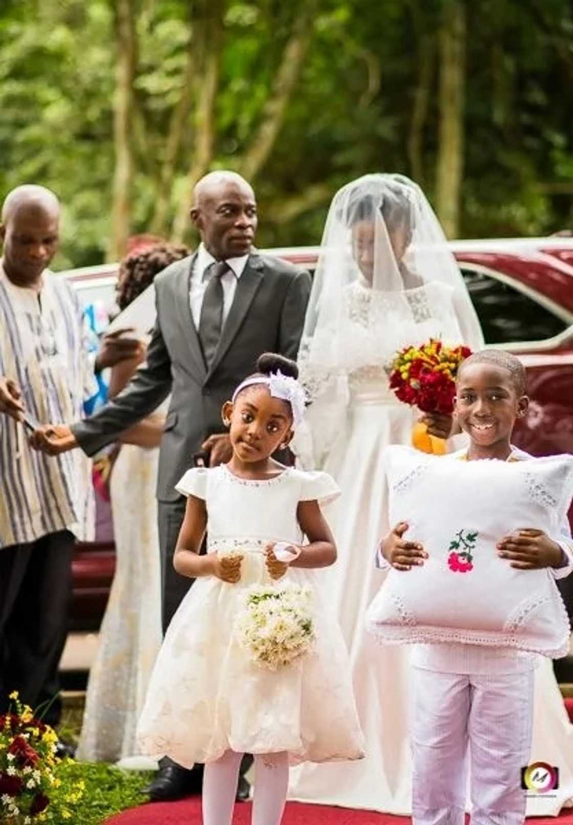 Wedding photos of Manasseh Azure Awuni and Becky