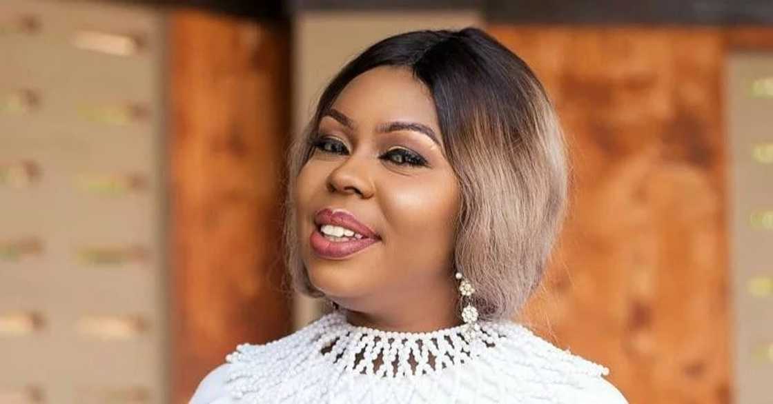 A woman wearing a white dress A woman wearing a white dress