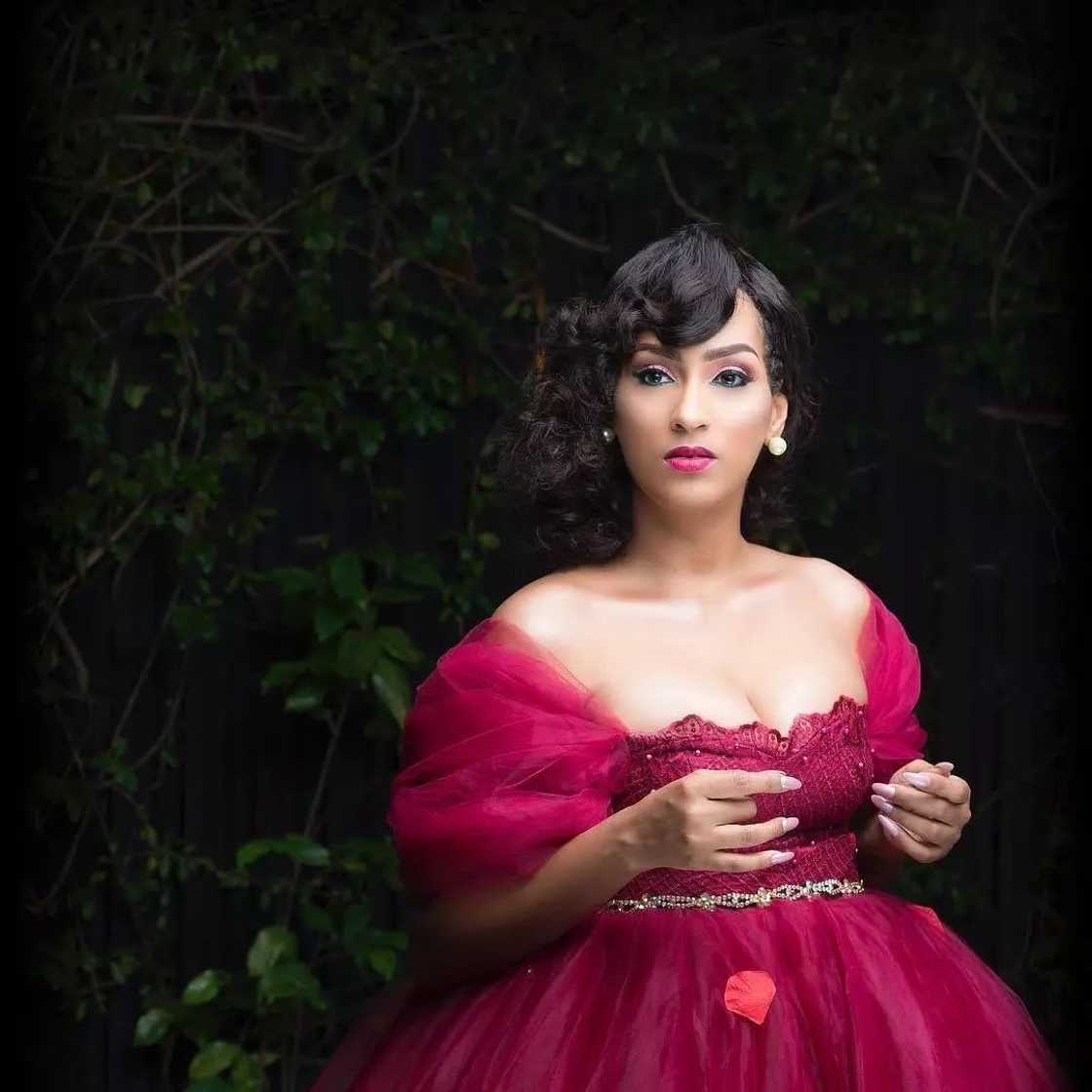 A woman wearing a pink dress A woman wearing a pink dress