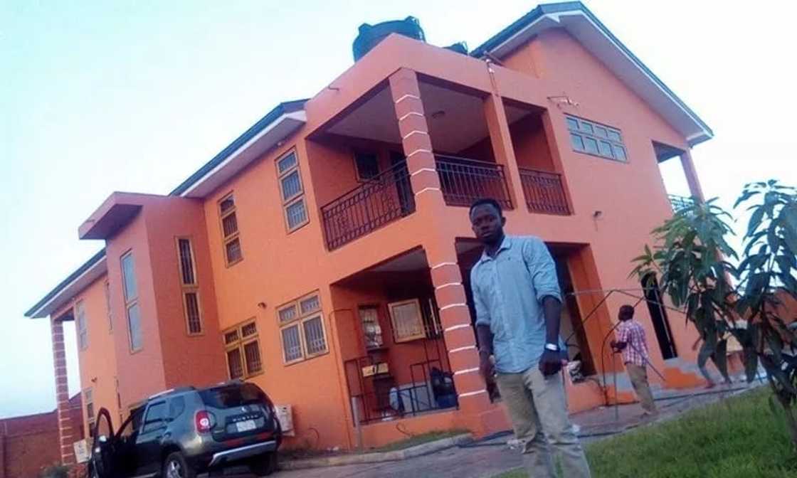 Paulin Degbevi showcasing one of his beautiful painting works Paulin Degbevi showcasing one of his beautiful painting works