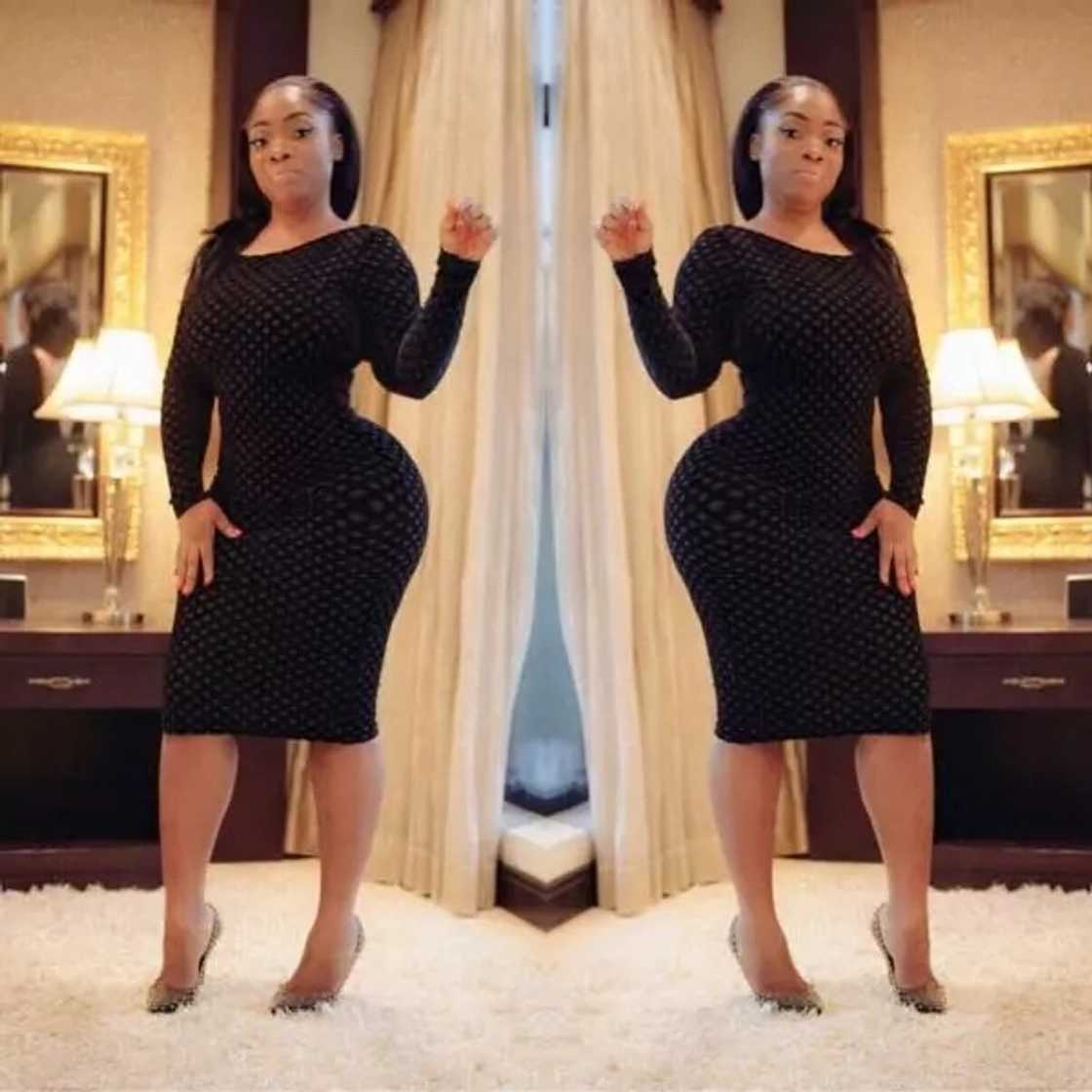 Moesha Boduong wearing a black dress