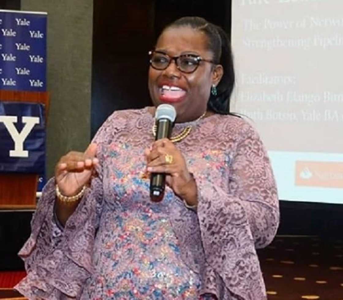 A woman holding a microphone A woman holding a microphone